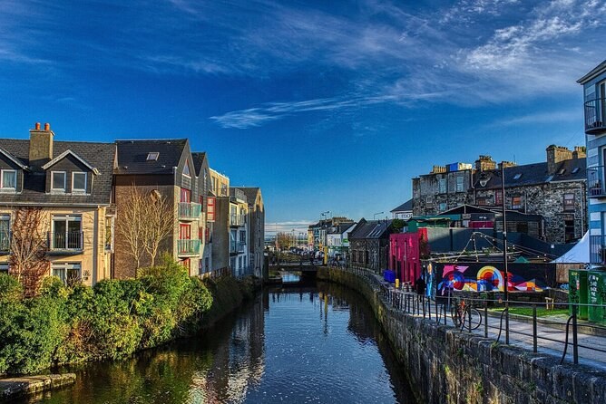A canal running through Galway between the houses