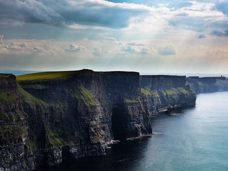 The Cliffs of Moher under broken cloud, the Atlantic below