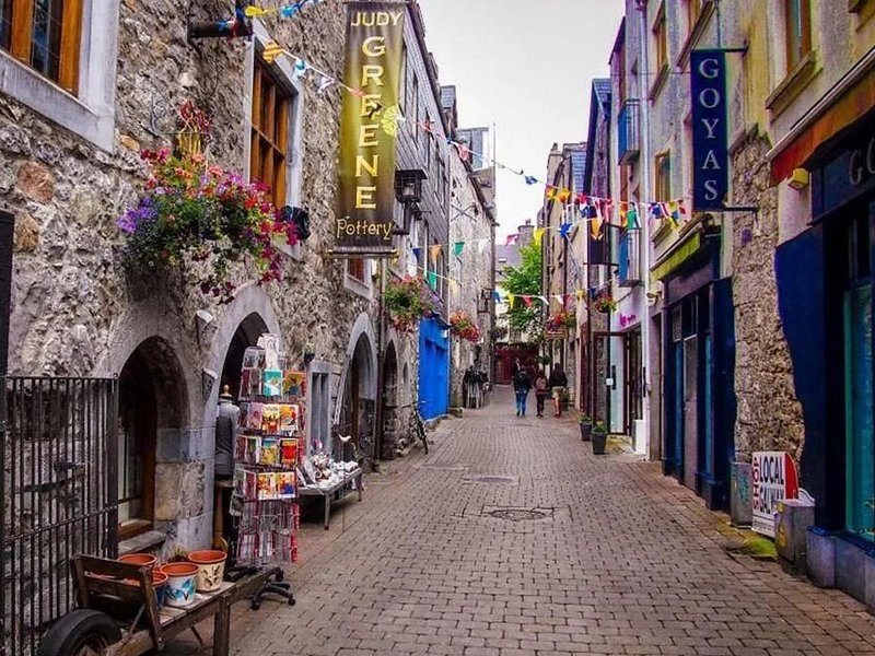 Painted shopfronts along a lane in Galway's Latin Quarter