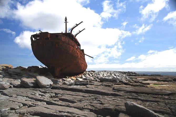 The rusted hull of the Plassey on the rocks of Inis Oírr
